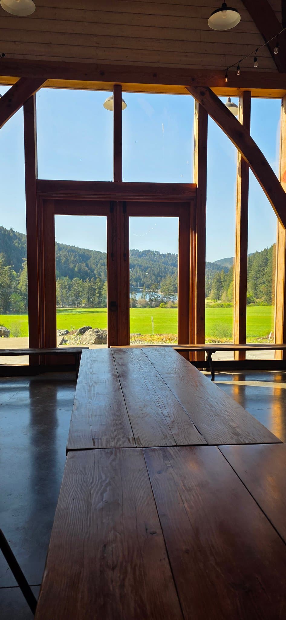 The view through the barn's glass wall at Birds Eye Cove Farm